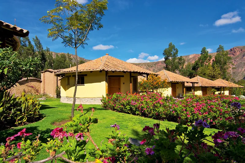 Sacred Valley hotel casitas on flat ground with mountain views