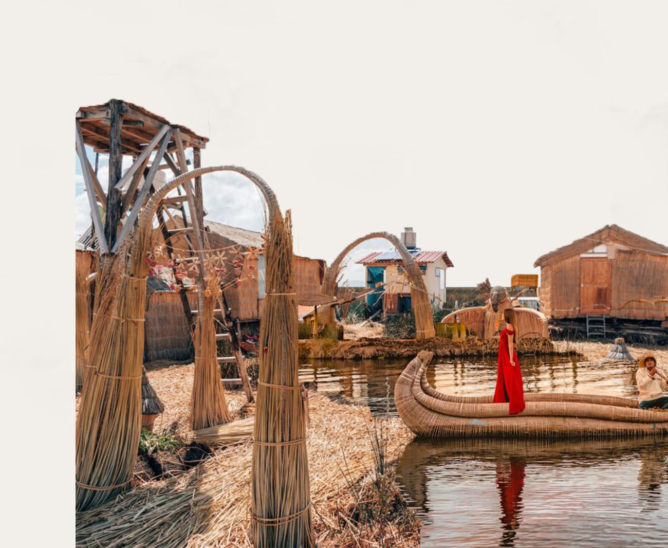 Boats on Lake Titicaca with distant islands and hills.