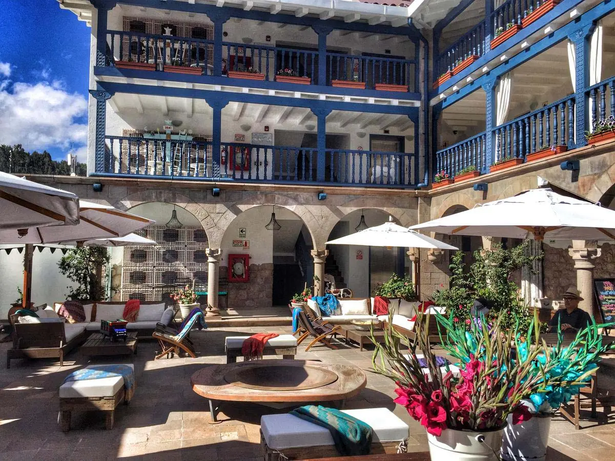 Sunny courtyard of a boutique hotel in Cusco, the last stop once travellers are rested